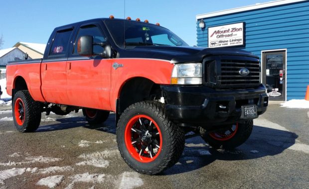 Lifted Harley F250 on fuel wheels and fatboy plate